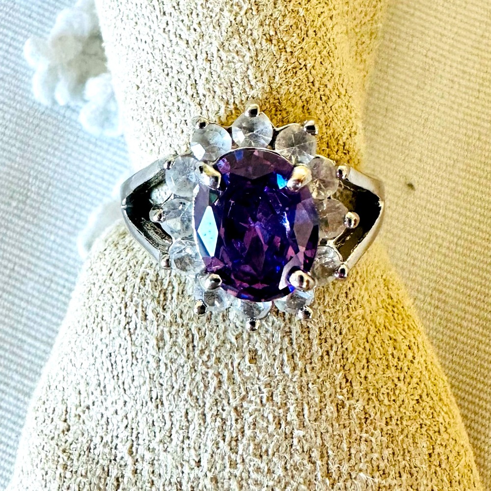 Iridescent purple ring with cubic zirconia surround